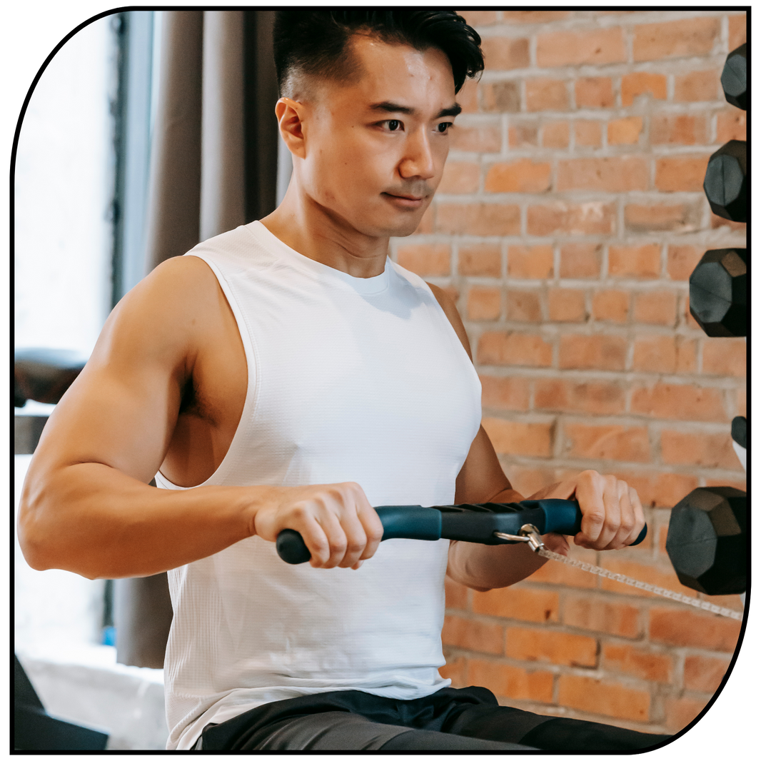 Man performing seated cable rowing exercise for stronger back and muscles.